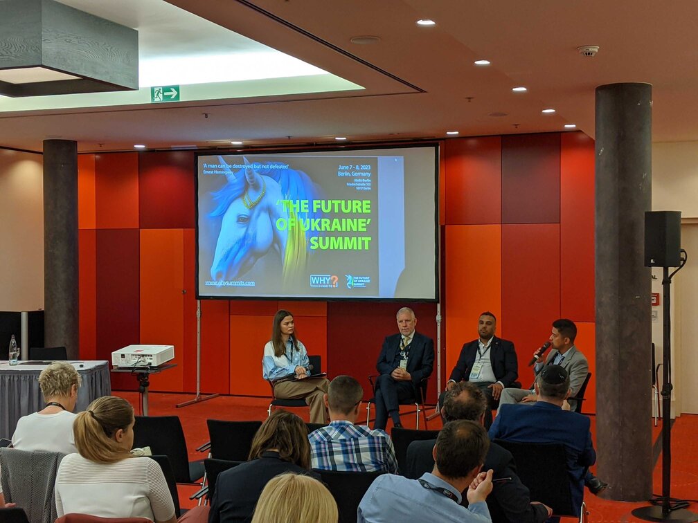 Dr. Kim J. Zietlow participating in a panel discussion at the Future of Ukraine Summit in Berlin in June 2023.